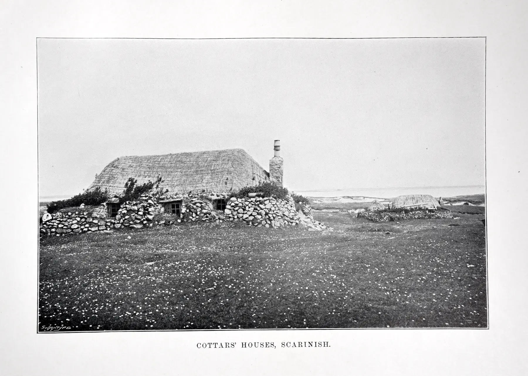Historic photograph of stone and thatch cottars' houses at Scarinish on Tiree in 1903